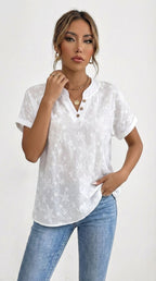 Lina - Blusa con drapado floral