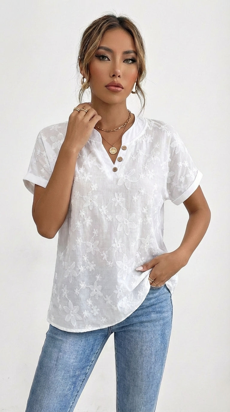 Lina - Blusa con drapado floral