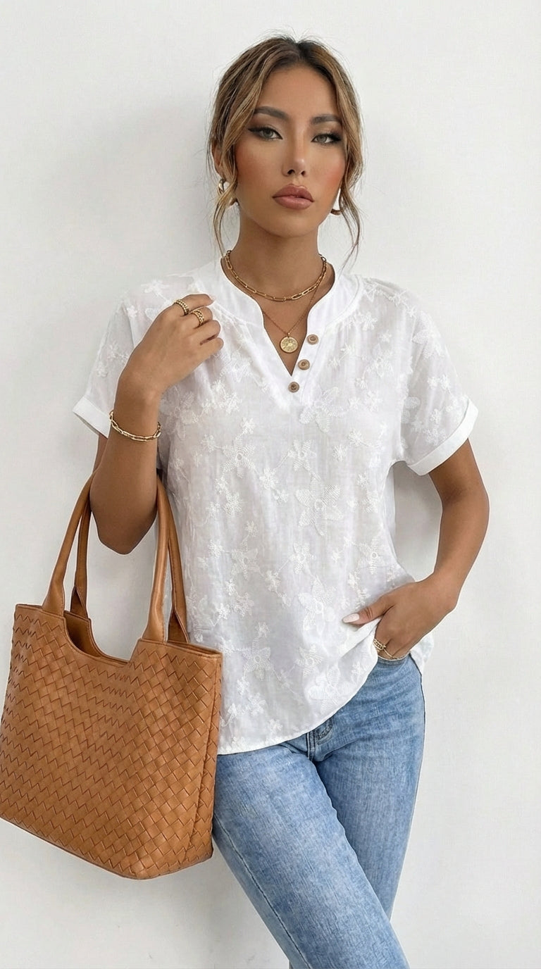 Lina - Blusa con drapado floral