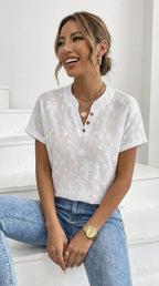 Lina - Blusa con drapado floral