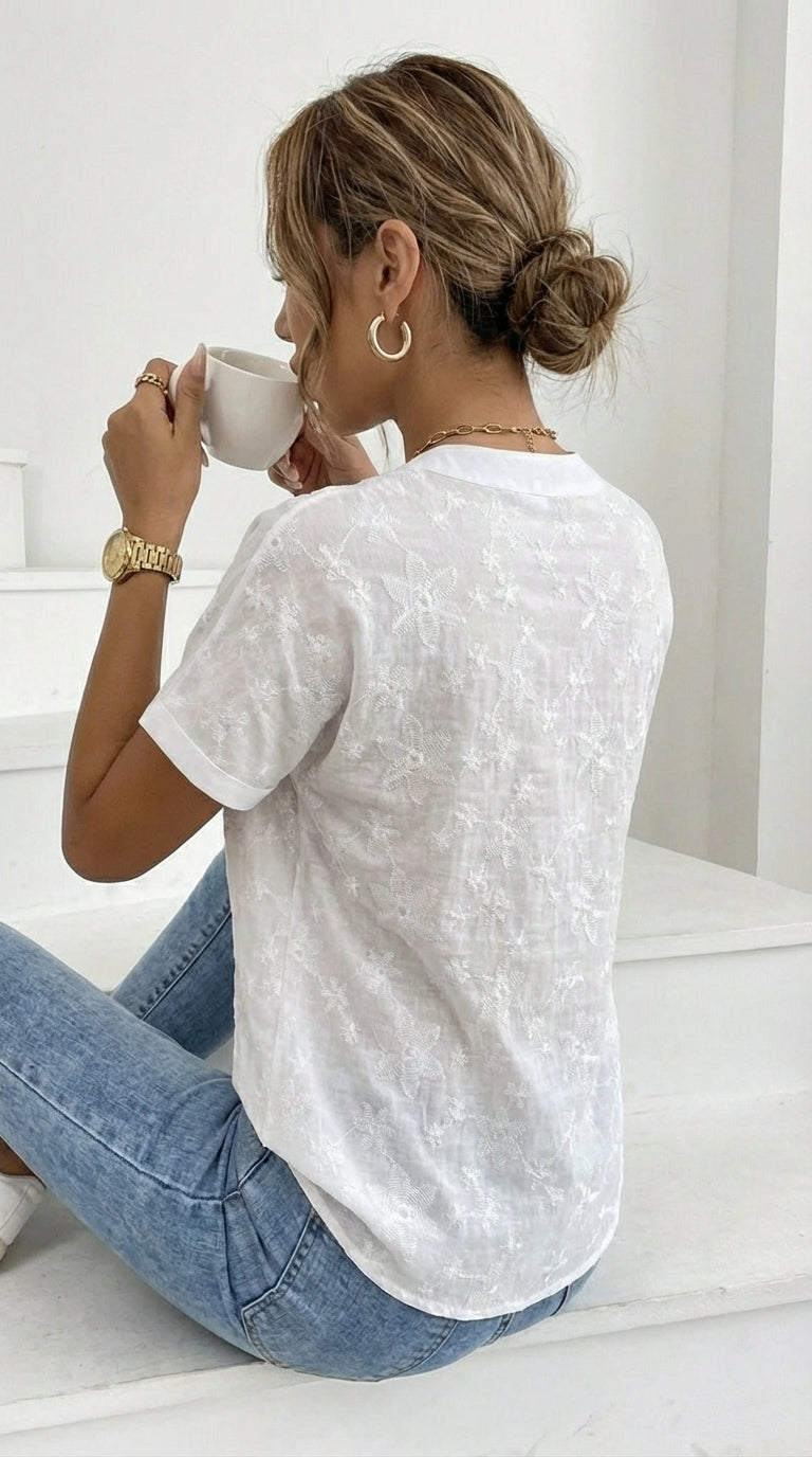 Lina - Blusa con drapado floral